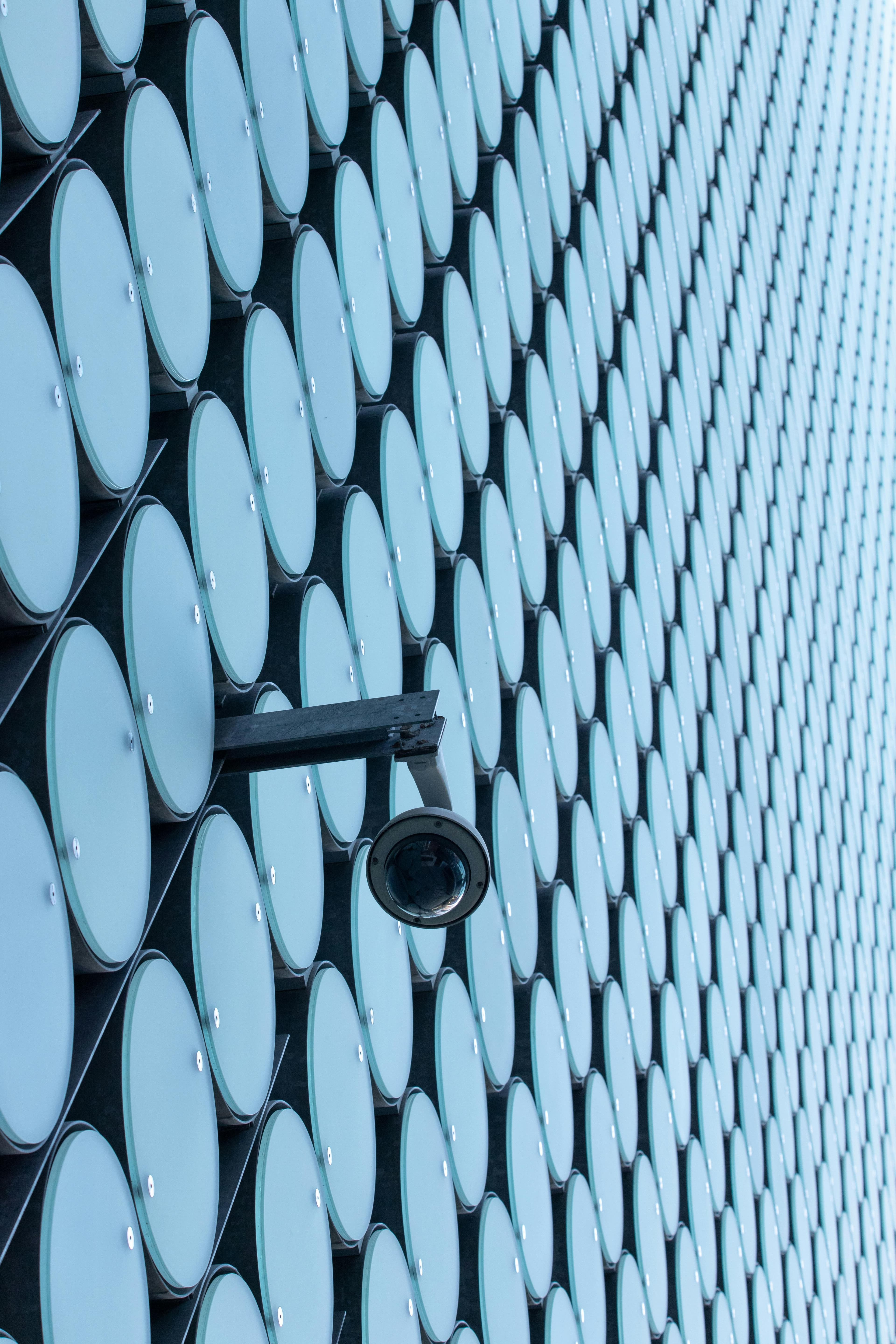 Network security operations center with monitoring screens.